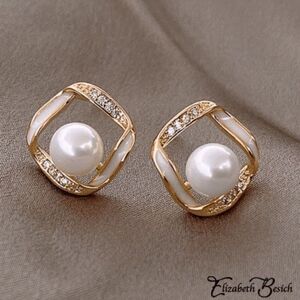 2/$21 Ladies Pink Woven Earrings